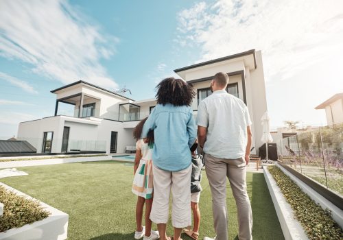 Love, new house and family in their backyard together looking at their property or luxury real esta